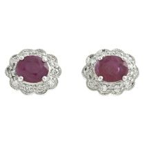 A pair of ruby & diamond cluster earrings