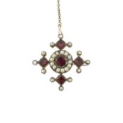 An early to mid 19th century foil-backed garnet & split pearl brooch