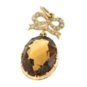 A citrine & split pearl bow pendant