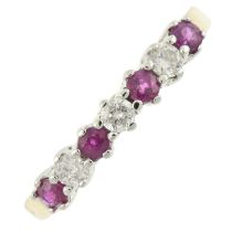 An 18ct gold ruby & diamond seven-stone ring