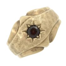 A mid 20th century 9ct gold garnet single-stone ring