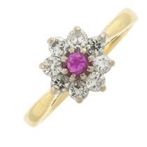 An 18ct gold ruby & diamond cluster ring