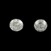 Two-brilliant-cut diamonds, 1.11ct. One glass-filled