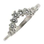 An 18ct gold diamond shaped band ring