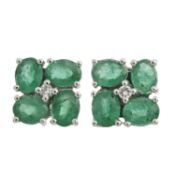 A pair of 18ct gold emerald & diamond stud earrings