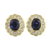 A pair of sapphire & diamond cluster earrings