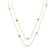 An 18ct gold emerald & diamond necklace