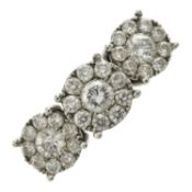 A diamond triple cluster ring