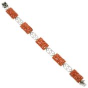 An Art Deco carved coral panel bracelet