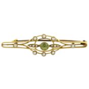 An early 20th century peridot & split pearl bar brooch