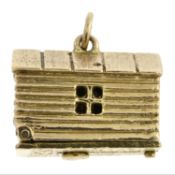 A mid 20th century 9ct gold garage charm