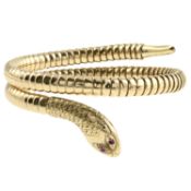 A 9ct gold ruby snake bangle, by Cropp & Farr