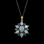 A 9ct gold sapphire & opal pendant, with chain