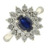 A sapphire & diamond cluster ring