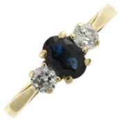 An 18ct gold sapphire & diamond three-stone ring