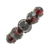 A garnet five-stone ring