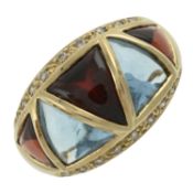 A topaz, garnet & diamond dress ring