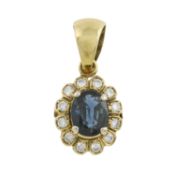 A sapphire & diamond cluster pendant