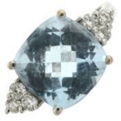 A topaz & diamond dress ring