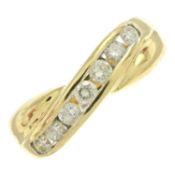 An 18ct gold diamond band ring