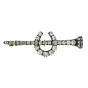 A late Victorian silver, gold and diamond nail and horseshoe brooch