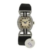 Elizabeth Taylor: An Art Deco, diamond and onyx watch, by Cartier, circa 1925