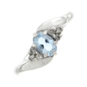 An 18ct gold aquamarine & diamond dress ring