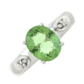 An 18ct gold green tourmaline & diamond dress ring