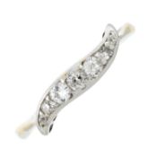 A diamond wave dress ring