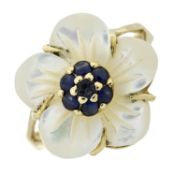 A floral carved mother-of-pearl & sapphire dress ring