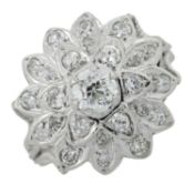 A diamond floral cluster ring