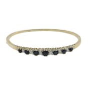 A 9ct gold sapphire & diamond hinged bangle