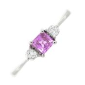 A pink sapphire & diamond three-stone ring