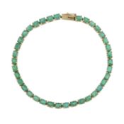 A 9ct gold emerald line bracelet