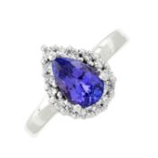 An 18ct gold tanzanite & diamond cluster ring