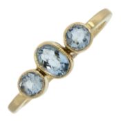 A mid 20th century aquamarine three-stone ring