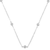 An 18ct gold necklace, with diamond spacers