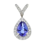 An 18ct gold tanzanite & diamond cluster pendant