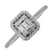 A diamond cluster dress ring