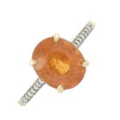 A 14ct gold orange garnet & diamond dress ring