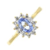 An 18ct gold sapphire & diamond cluster ring