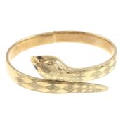 A 9ct gold snake bangle, with garnet eyes