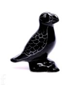 Anita Harris for Glazed Art, a contemporary figure of a puffin, modelled perched on rocky outcrop,