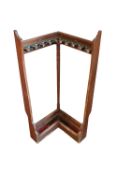 A wooden framed Corner of 'L' shaped Fishing Rod Holder, with ornate brass mounts. (1)