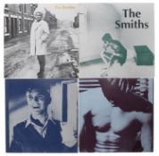 The Smiths - four vinyl records to include The Smiths (Rough 61); What Difference Does It Make? (