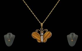 9ct Gold Butterfly Pendant, set with Tig