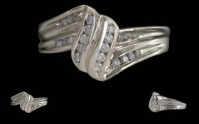 9ct White Gold Dismond Set Crossover Clu