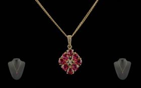 9ct Gold Gem Set Pendant, Central Round Cut Diamond Surrounded By 8 Pear Shaped Stones, suspended On