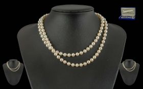 Mikimoto Cultured Pearl Necklace of Long Length. Well Matched Pears of Excellent Colour / Lustre.