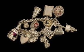 Excellent Quality Sterling Silver Curb Bracelet, Loaded with 14 Silver Charms, All Fully Hallmarked.